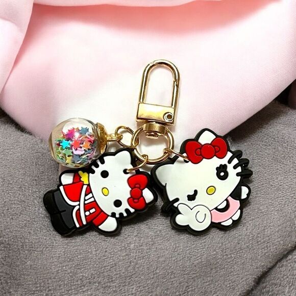 Hello Kitty Winking Confetti Ball Gold Tone Bag Charm Zipper Pull - Picture 2 of 2